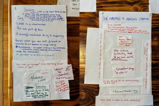 Handwritten notes spread across a table, mapping content ideas for a learning journey